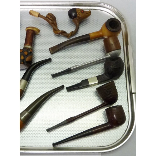 45 - A collection of smokers' pipes incl carved examples.  A/F    504146, 636300, 628575