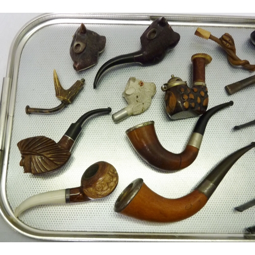 45 - A collection of smokers' pipes incl carved examples.  A/F    504146, 636300, 628575