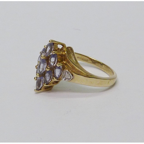 5 - A 9ct gold tanzanite & diamond dress ring. Approximately 2.5gr gross / size L 788620