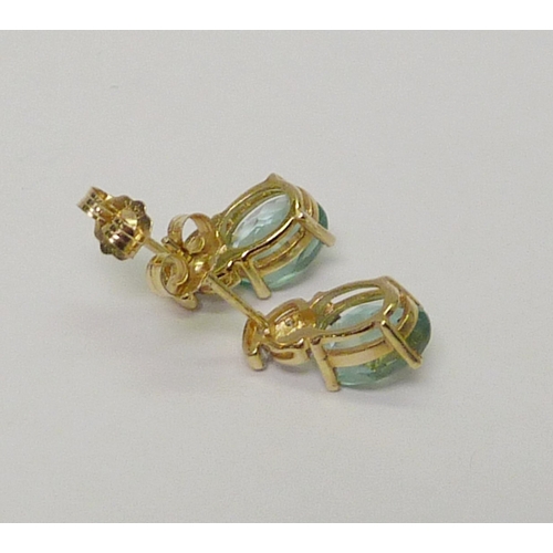 8 - A pair of stud earrings, unmarked yellow metal set with diamond & blue quartz.  Each 12mm long. 7366... 