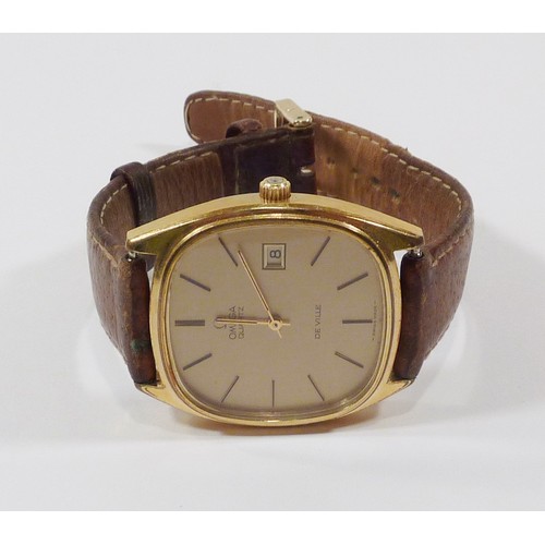 79 - An Omega De Ville wristwatch in a gold plated tonneau case with a snap-on case back bearing York-int... 