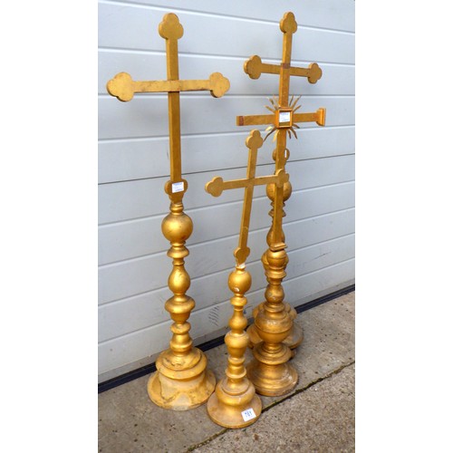 761 - Four gold painted wooden crosses, missing some pieces (ex York Minster Stores)