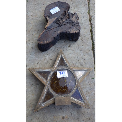 769 - An amber glass wooden framed star, to fix on a pole, 26cm wide together with a small piece of charre... 