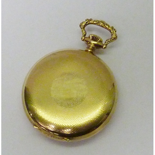 84 - A Hebdomas 8 Day pocket watch by Limit of Switzerland, having a keyless wind lever movement in a gol... 