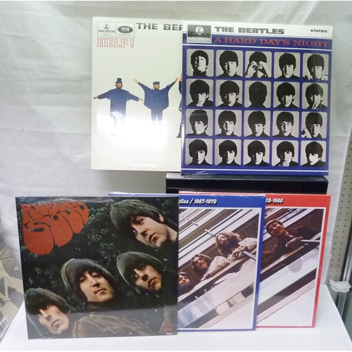 86 - The Beatles - a boxed collection of twelve albums issued by de Agostini.  All unopened in cellophane... 