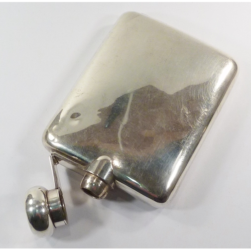 12 - A silver hip flask, London 1935.  150 x 100mm  / 210gr gross.  A/F bruised
30888