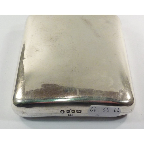 12 - A silver hip flask, London 1935.  150 x 100mm  / 210gr gross.  A/F bruised
30888