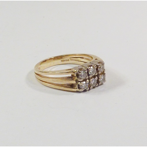 41 - A Mappin  & Webb rectangular cluster ring comprising six brilliant cut diamonds in an 18ct gold cont... 