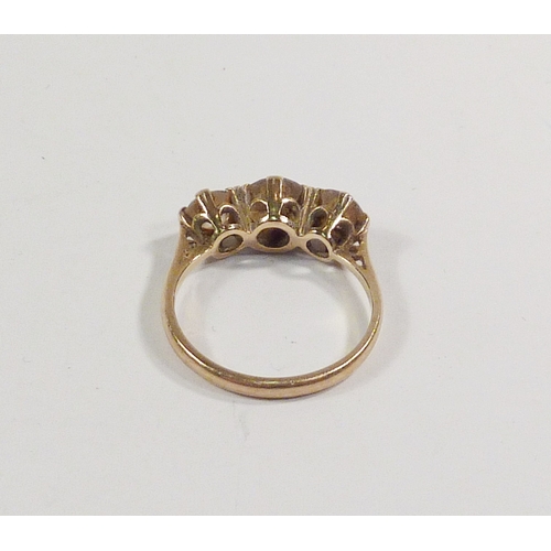 44 - A trilogy ring comprising three paste stones in a 9ct gold setting.  Stones abraded.  Gross weight 2... 