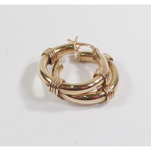 48 - A pair of hollow hoop earrings having twist ring embellishment, 9ct gold.  22mm diameter / approx 2.... 