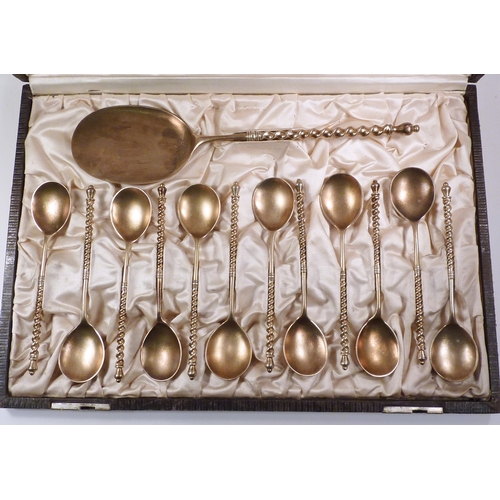 52 - A Brahmfeld & Gutruf cased set of German gilt white metal ice cream cutlery comprising a server and ... 