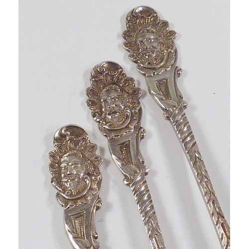 53 - Six matching silver teaspoons having bearded mask terminals, Chawner & Co, London 1868.  Each 114mm ... 