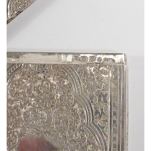 54 - A Victorian silver visiting card case, Birmingham 1876. 95 x 65mm / 64gr.  The whole presented in it... 