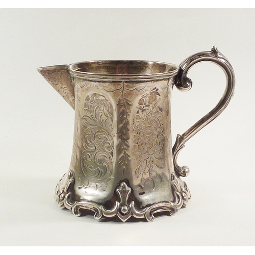 57 - An early Victorian silver cream jug, William Phillips, London 1849.  85mm tall / 119gr.