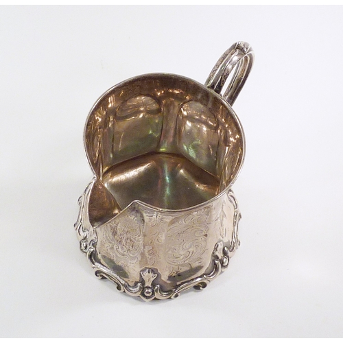 57 - An early Victorian silver cream jug, William Phillips, London 1849.  85mm tall / 119gr.