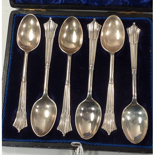 60 - A cased set of six silver teaspoons; a cased set of six silver teaspoons with a matching sugar tongs... 