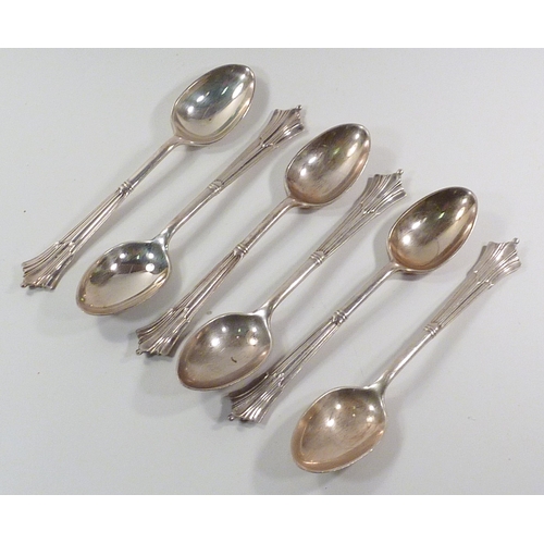 60 - A cased set of six silver teaspoons; a cased set of six silver teaspoons with a matching sugar tongs... 