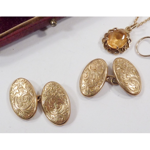 77 - A pair of 9ct gold chain link cufflinks, heads 18 x 10mm oval / 2.4gr; a 9ctgold and citrine pendant... 