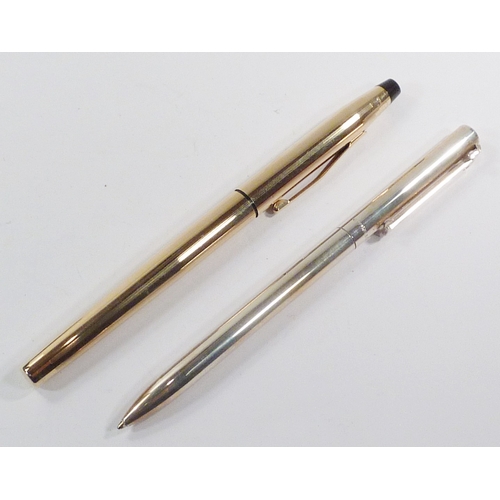 82 - A Tiffany & Co ball-point pen, silver marked Sterling 925, with soft bag; a Cross gold plated founta... 