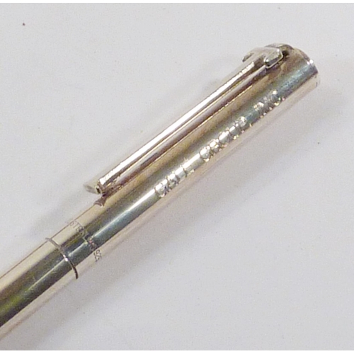 82 - A Tiffany & Co ball-point pen, silver marked Sterling 925, with soft bag; a Cross gold plated founta... 