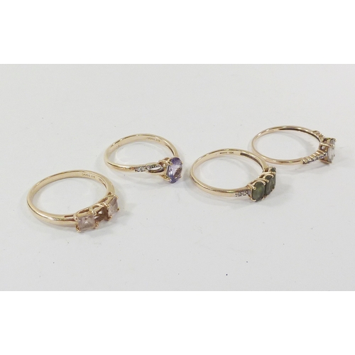 10 - A 9ct gold solitaire ring of twist design set with tanzenite; a 9ct gold three stone ring lacking th... 