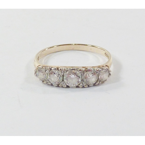 102 - A five stone ring comprising cubic zurconia in a 9ct gold setting.  Gross weight 1.9g