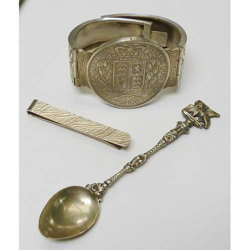 38 - A 1847 silver crown bracelet together with silver handled spoons etc