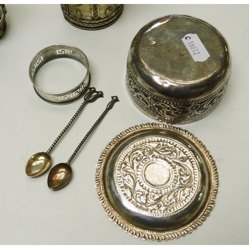 66 - A white metal bowl, 80mm diameter; a white metal  cased coffee glass and scent bottle; etc