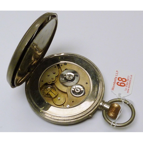 68 - An oversized pocket watch having a pin set lever movement in a base metal case.  102mm across case.