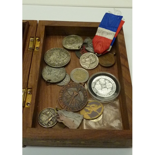 94 - A group of coins, fantasy coins and tokens; a wristwatch, medals etc.