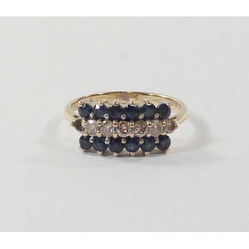 99 - A triple row cluster ring comprising diamonds and sapphires in a 9ct gold setting.  A/F one diamond ... 