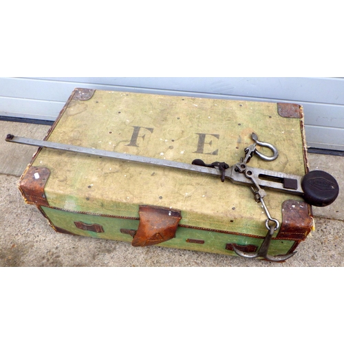 886 - A canvas trunk together with a qty of stands and a set of hanging Avery scales