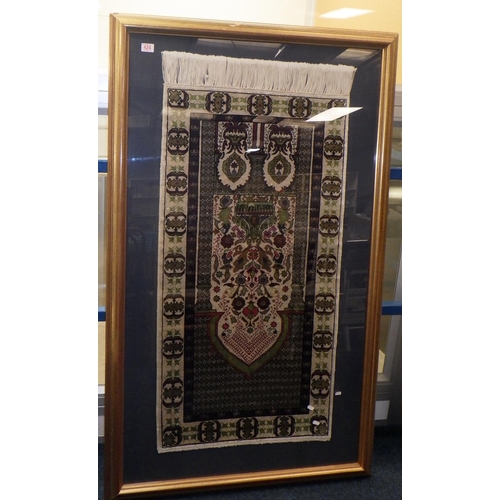 237 - A framed prayer rug (130 x 63cm rug )