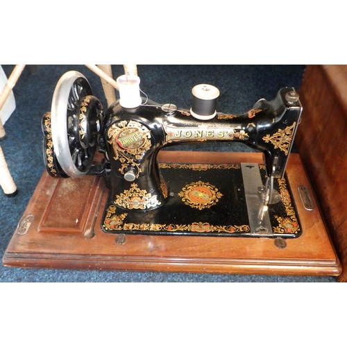 46 - A table top cased Jones sewing machine together with a small sewing box (2)