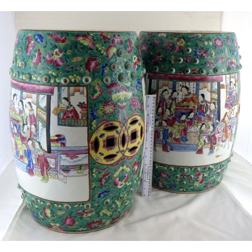 101 - A pair of Chinese porcelain famille vert stools.  49cm tall