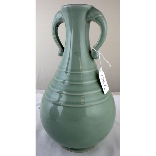 105 - Two celadon glaze vases, one green and one red.  Red vase 34cm tall.