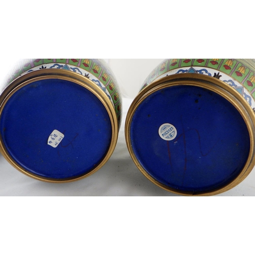 113 - A pair of Chinese cloisonné enamel vases having carved bases. Each 35cm total height