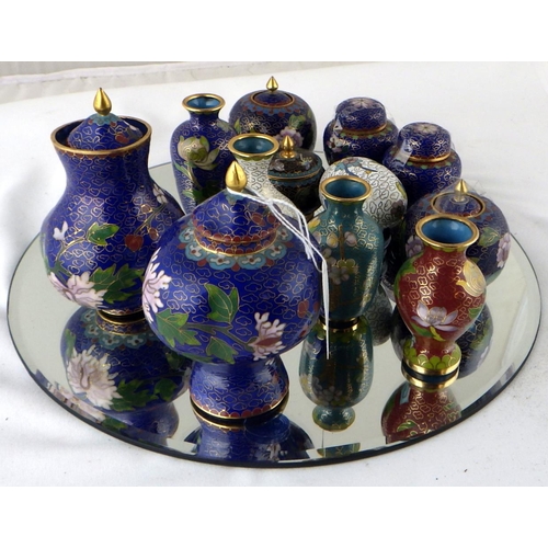 117 - A collection of Chinese cloisonné enamel miniatures including four open vases and two covered vases.... 