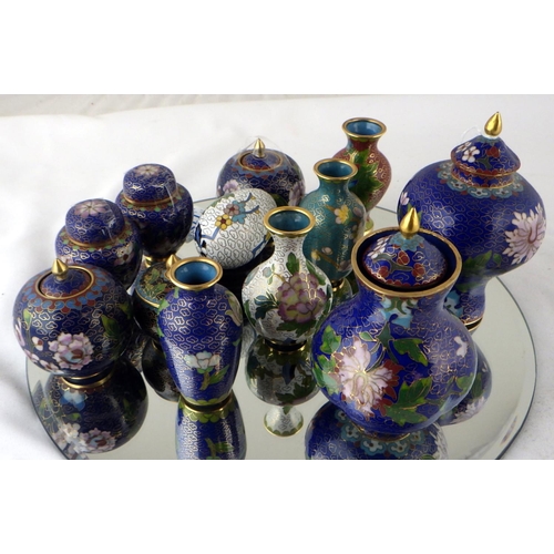 117 - A collection of Chinese cloisonné enamel miniatures including four open vases and two covered vases.... 