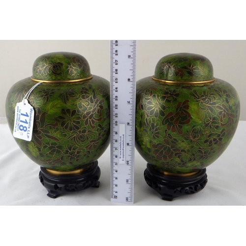 118 - A pair of Chinese cloisonné enamel ginger jars on carved stands.  Each approximately 18cm total heig... 