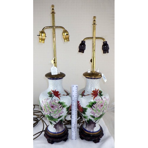 127 - A pair of Chinese cloisonné vase based table lamps on wooden stands.  69cm tall