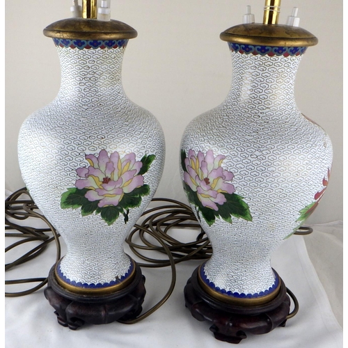 127 - A pair of Chinese cloisonné vase based table lamps on wooden stands.  69cm tall