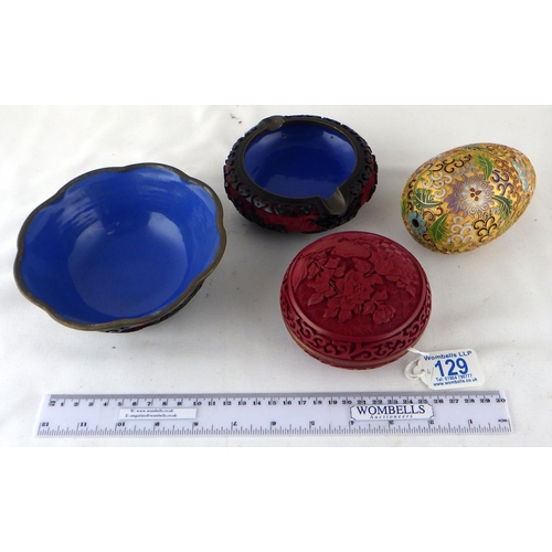 129 - A Chinese cloisonné enamel egg, 12cm tall; a Chinese black and red Cinnabar dish with similar ashtra... 