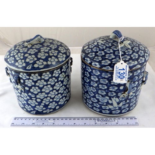 130 - Two Chinese circular porcelain covered boxes of matching design and having similar blue and white fl... 