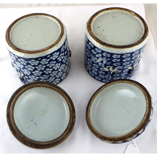 130 - Two Chinese circular porcelain covered boxes of matching design and having similar blue and white fl... 