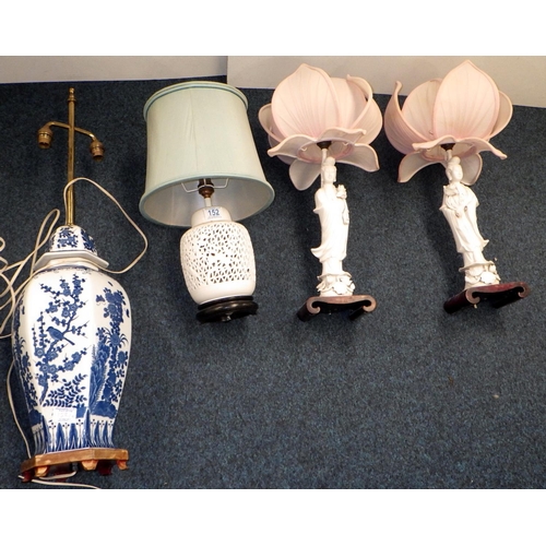 152 - A pair of Dehua porcelain / Blanc de Chine figural table lamps, 53cm tall with shades; two further t... 