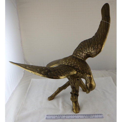 159 - A brass eagle.  55cm tall