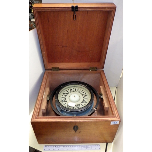 163 - A gimballed marine compass in a wooden case.