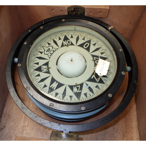 163 - A gimballed marine compass in a wooden case.