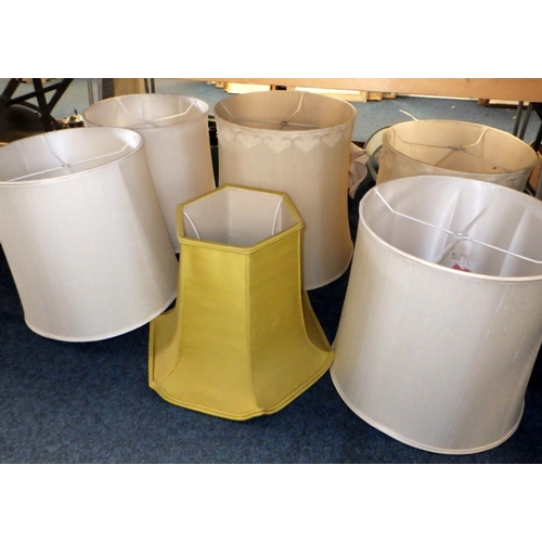 166 - A group  of cream-coloured fabric drum lampshades.